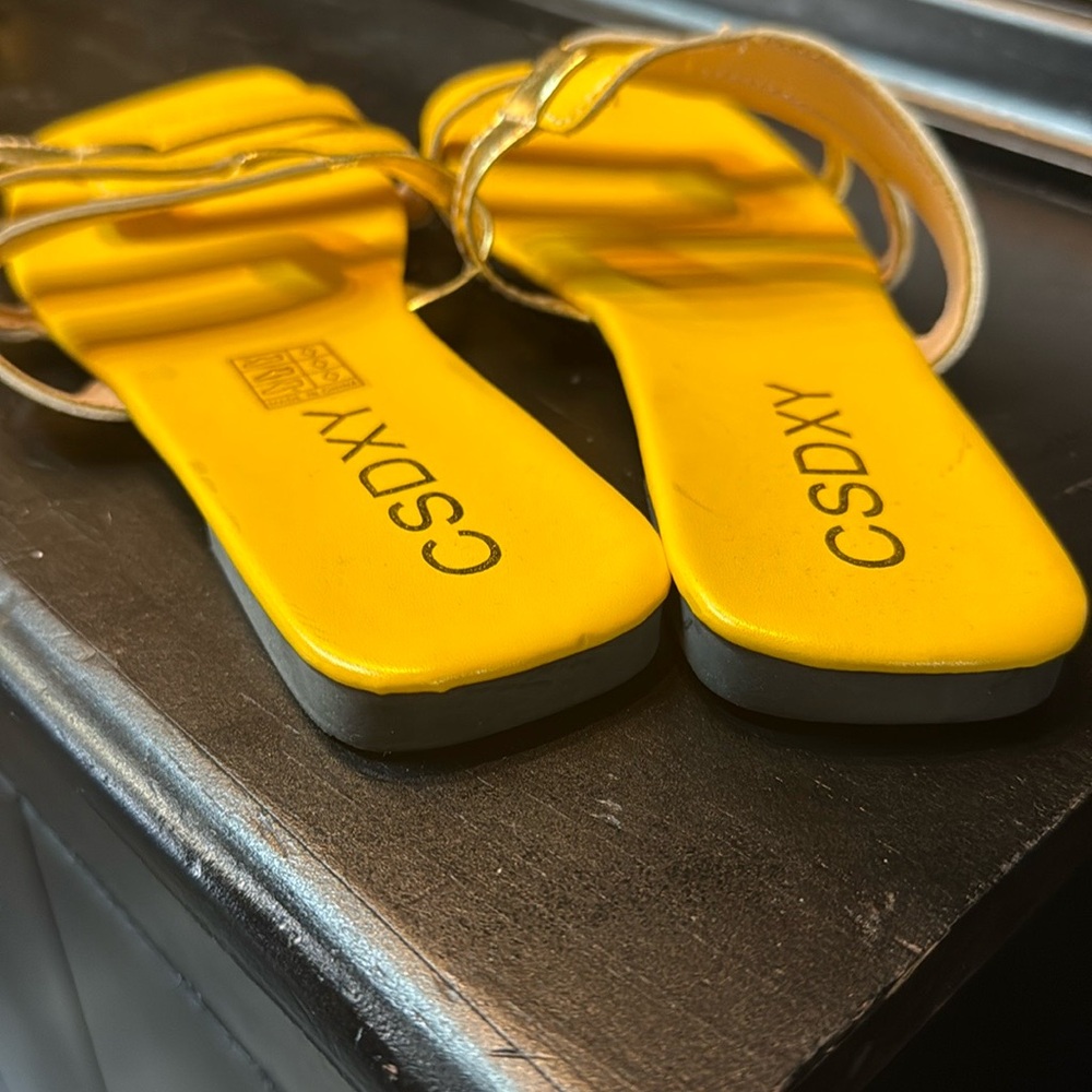 Yellow Sandals for Women, size 12 running short.  Fit women’s size 11